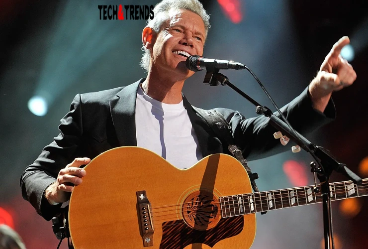 Randy Travis on stage, singing Randy Travis Net Worth